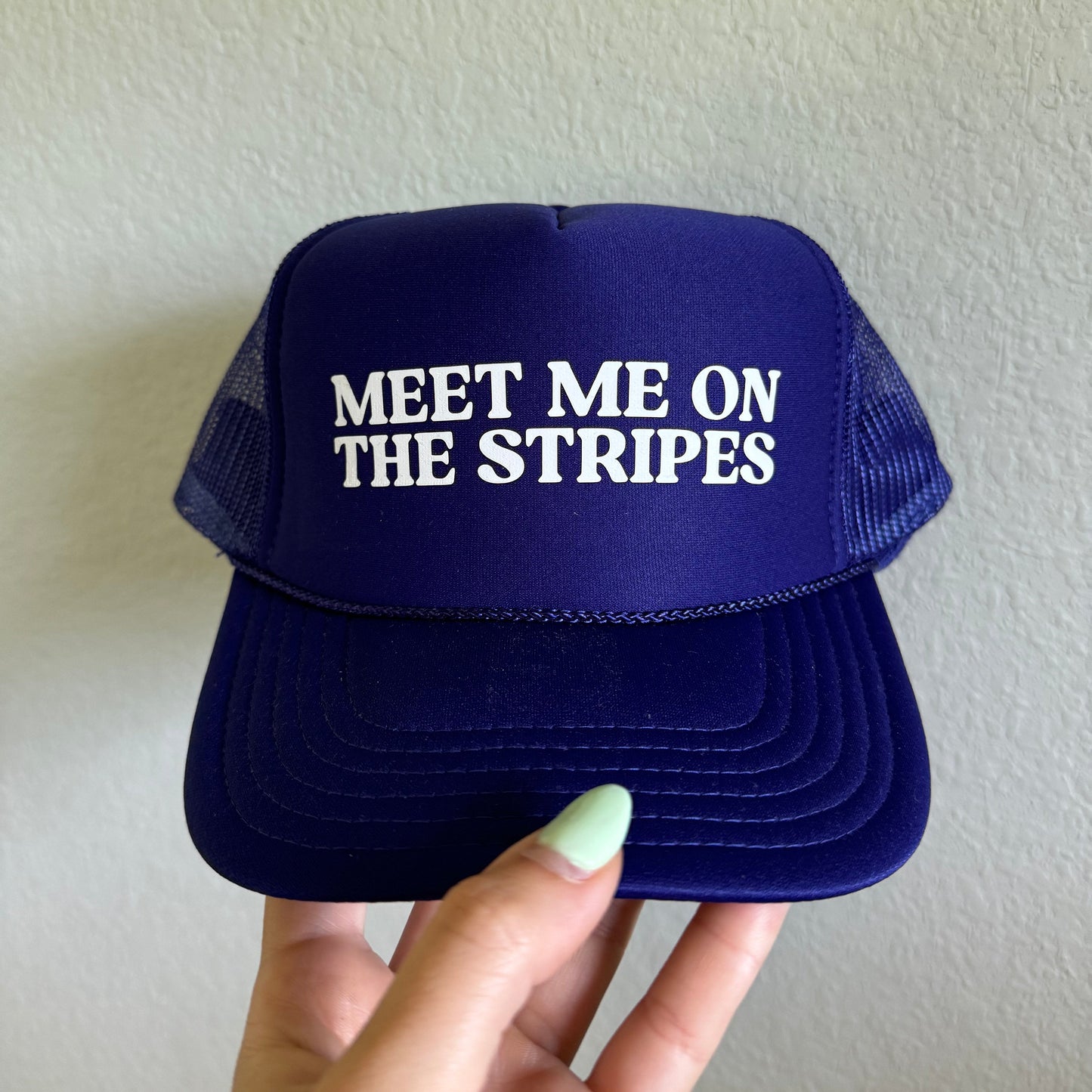 Meet Me on the Stripes UCA Purple Trucker Hat